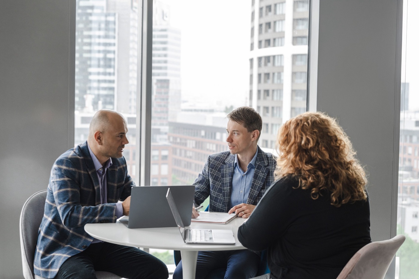 Michal Juhas in a strategy meeting with a client team