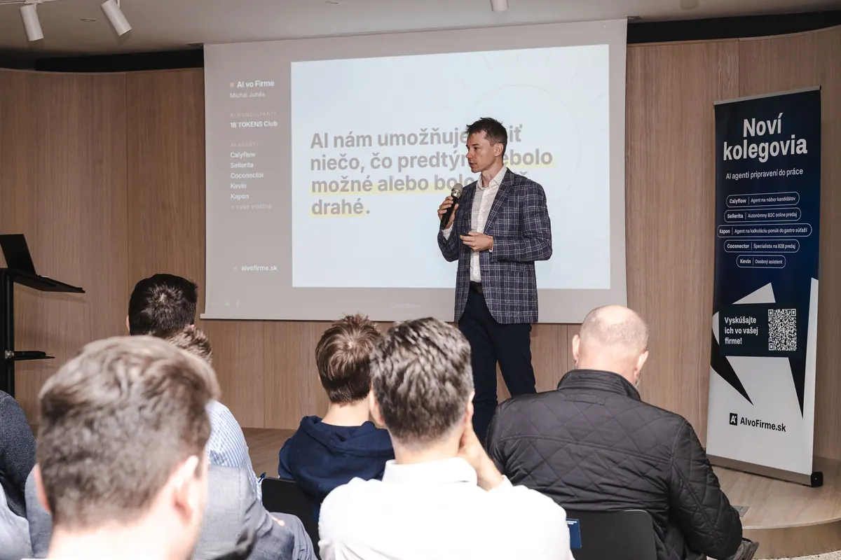 Michal Juhas presenting a slide about AI