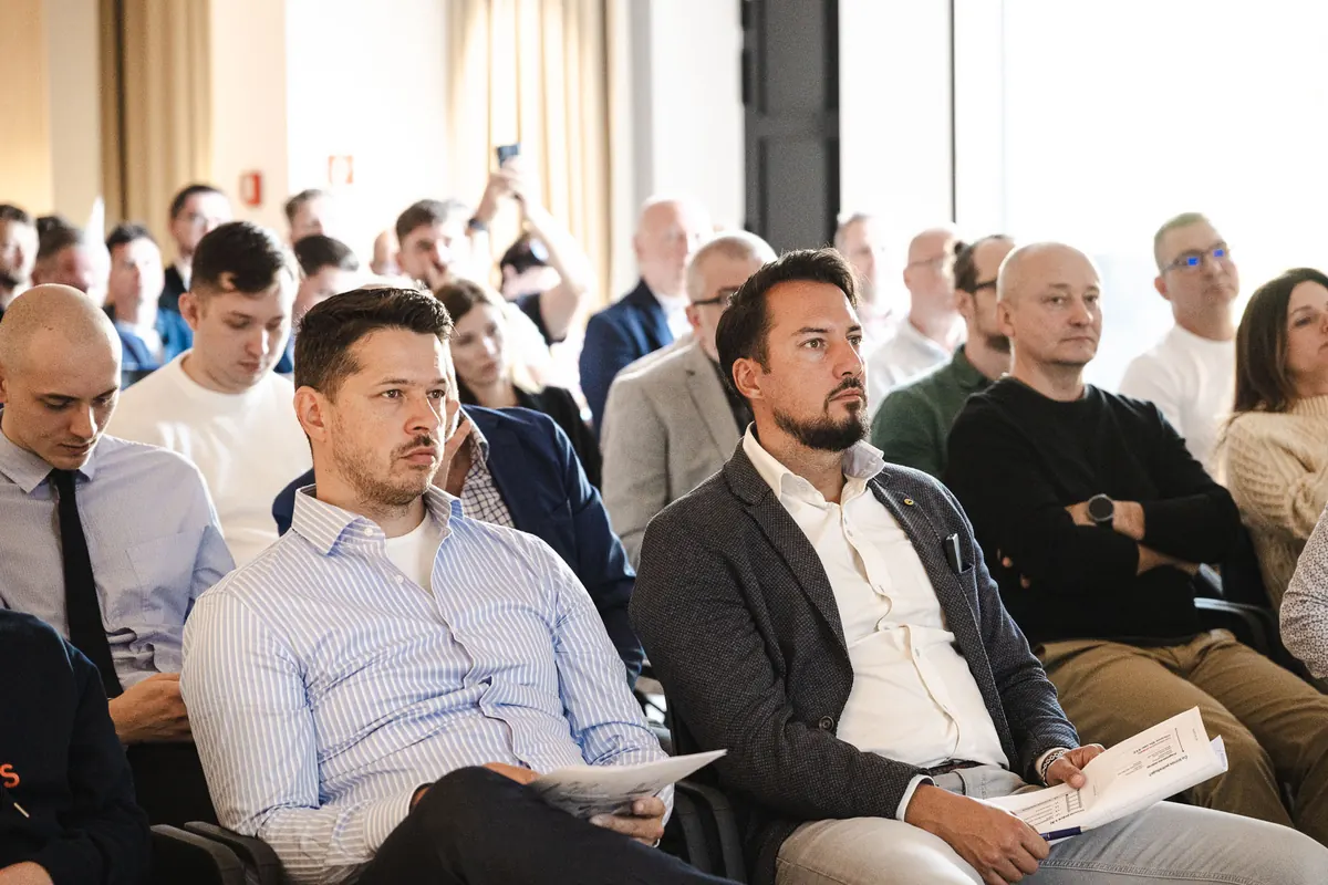 Attendees listening to the talk